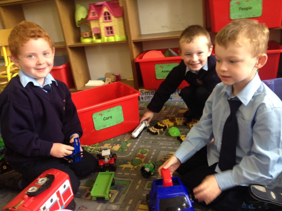 Tomás, James and Darragh love to play in the Small World Area.